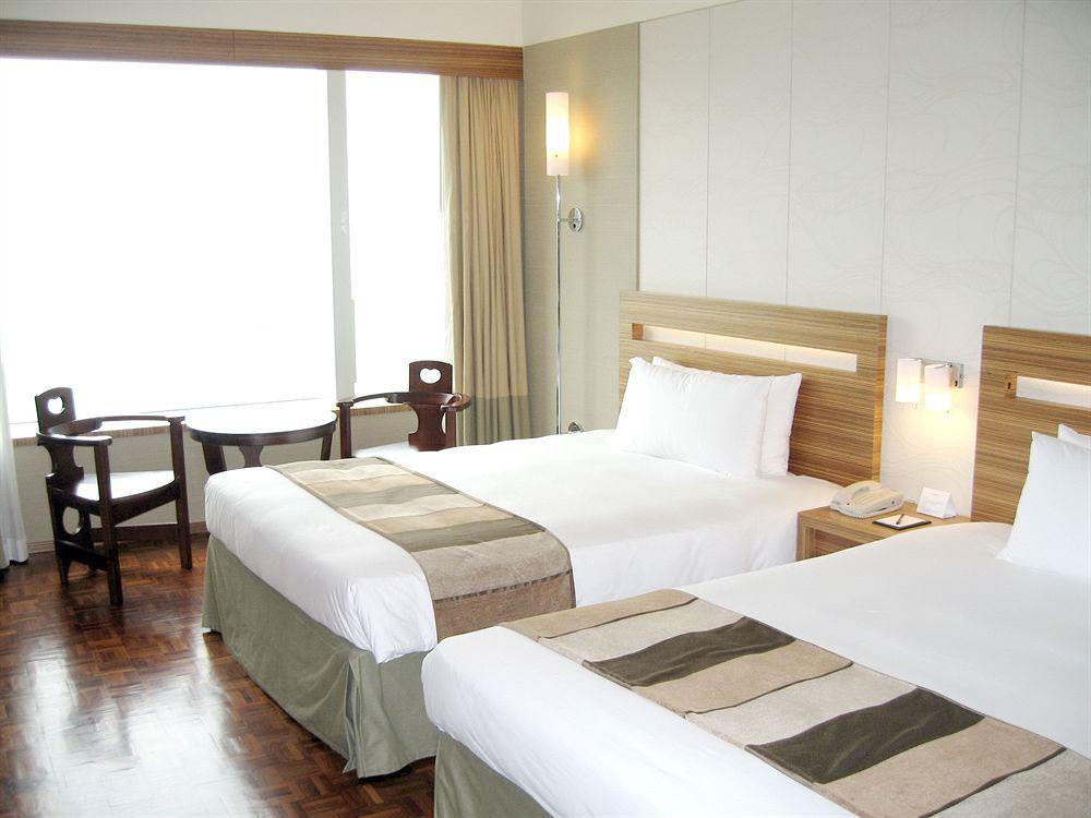 Nina Hotel Tsuen Wan West Hong Kong Exterior foto A room at the hotel